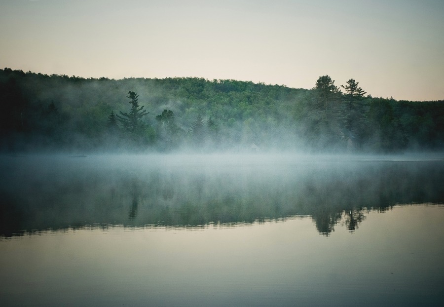 Fog rolls across the lake