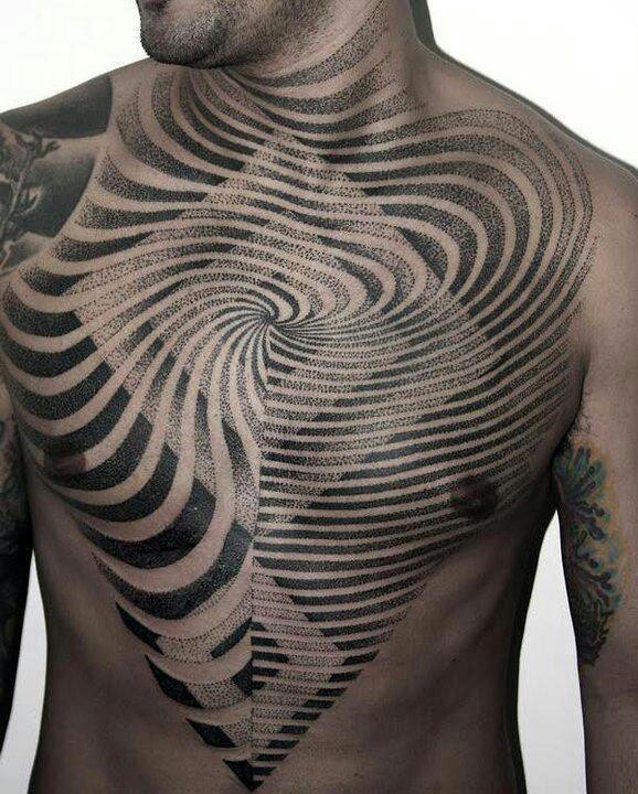 Hypnotizing chest tattoo by Narazeno Tubaro
